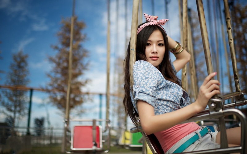 child, looking at viewer, looking, portrait, trees, three quarter length, 1080P, teenager, playground, day, model, focus on foreground, women, females