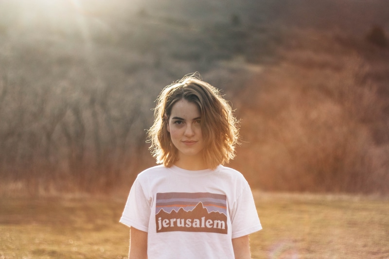adobelightroom, bright, flare, roam, tshirt, haired, 5K, short hair, one person, brown, text, white, canon70d, waist up, beautiful woman, woman, standing