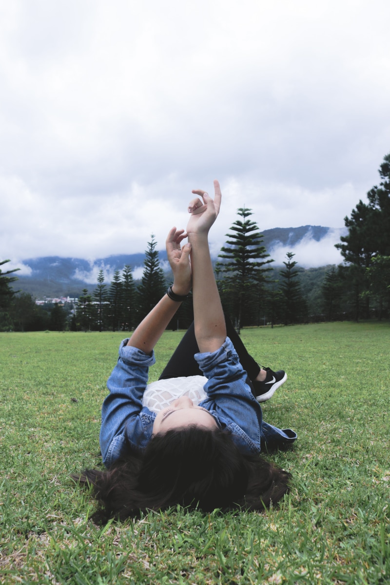 women, young adult, leisure activity, relaxation, sky, grass, boquete, fog, nature, trees, arms raised, hands, field, create, green, forest, outdoors, explore