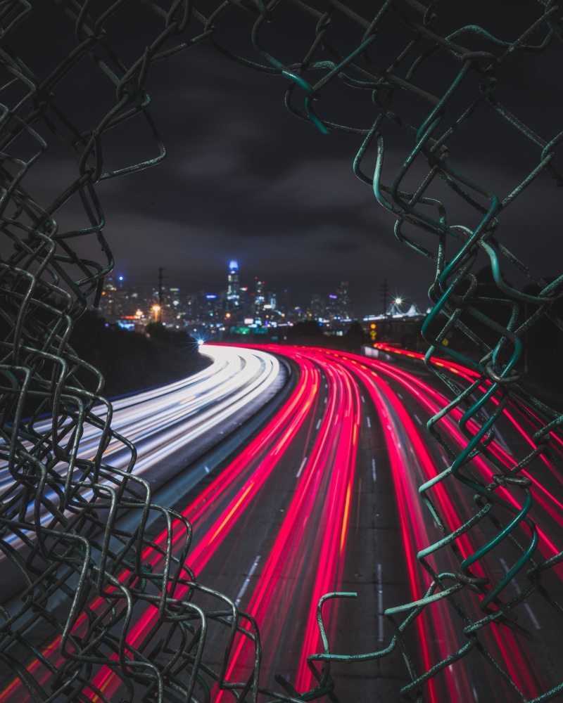 cars, night, urban, broken, speed, road, illuminated, light streaks, blur, bridge, lighting equipment, sky, no people, dark, motion, evening, photography