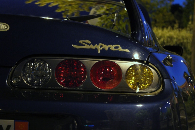 day, vehicle interior, luxury, 5K, headlight, no people, control panel, Toyota Supra, windshield, land vehicle, steering wheel, focus on foreground, motor vehicle