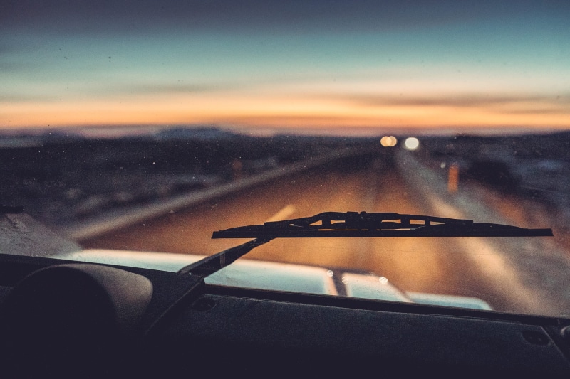 road ahead, motor vehicle, windscreen, on the move, 2K, no people, sky, journey, indoors, motion, control panel, land vehicle, vehicle, wipers, car, sunset