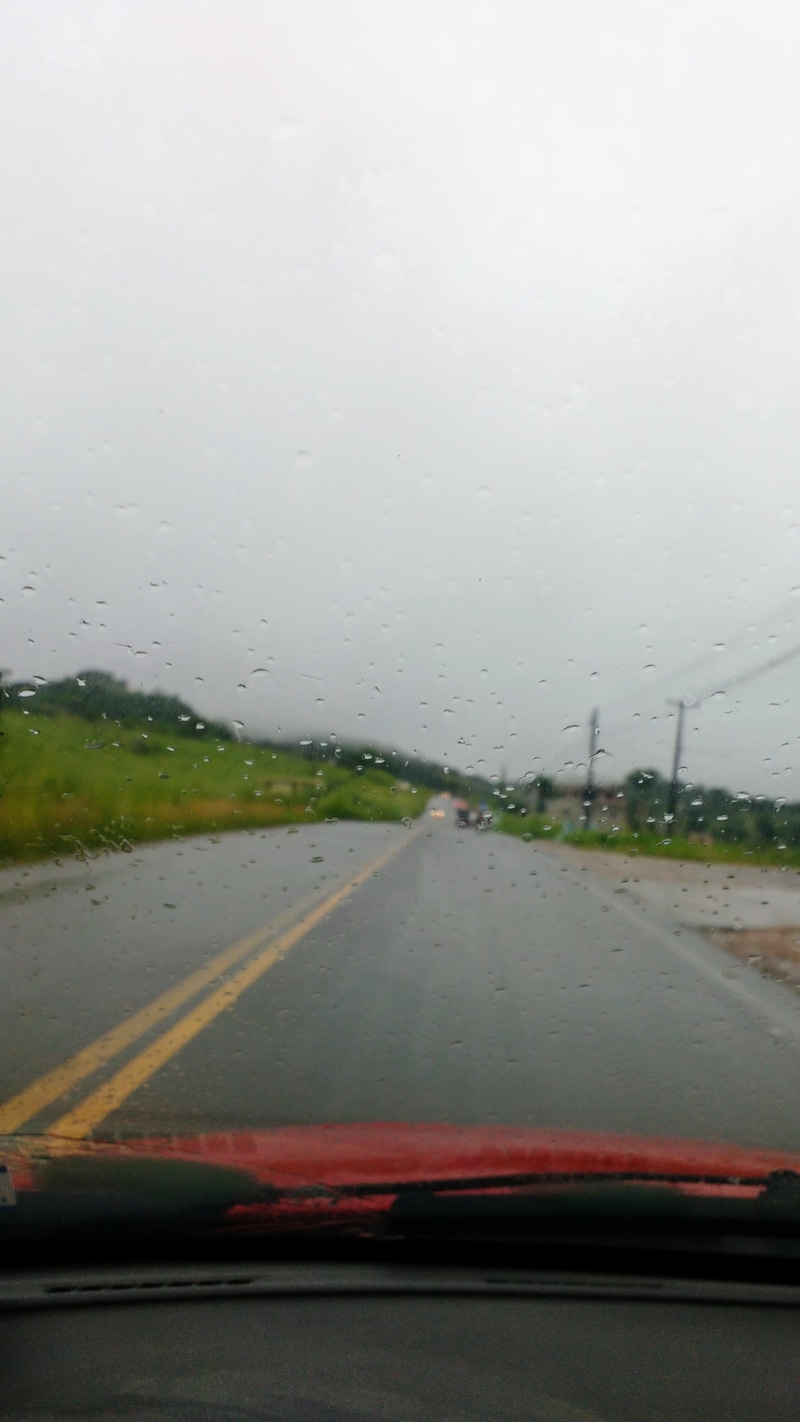 motor vehicle, raindrop, wet, sky, highway, land vehicle, mode of transportation, no people, drop, rainy season, vehicle interior, windshield, glass, joão alfredo