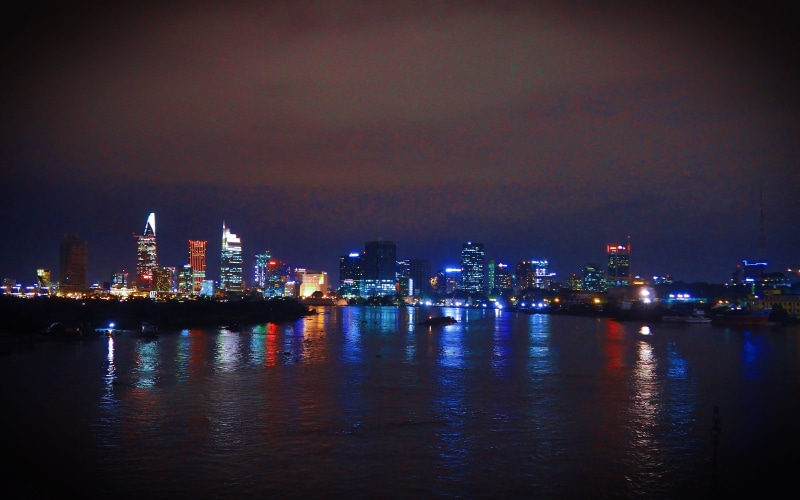 calm, architecture, financial district, built structure, no people, night, waterfront, skyscraper, bright, outdoors, city photography, reflection, illuminated