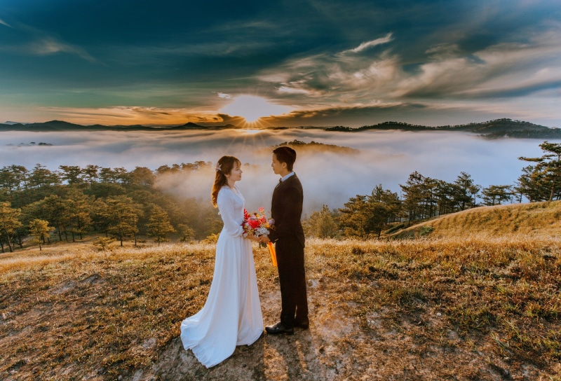 wife, cliff, bouquet, togetherness, couple, life events, groom, sky, two people, husband, woman, near, man, sea of clouds, flower arrangement, romance