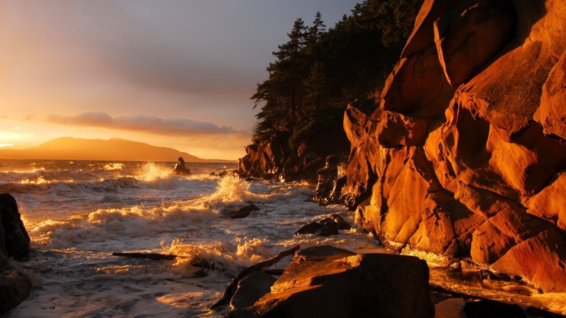 flowing water, rock, power in nature, rock - object, sea, sunset, beauty in nature, sky, wave, scenics - nature, outdoors, beach, motion, solid, tranquility
