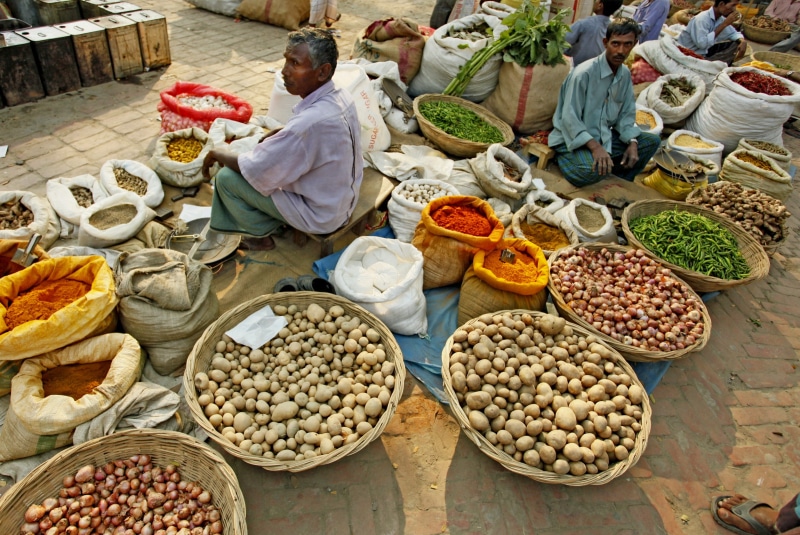 large group of objects, business, abundance, order, freshness, market stall, variation, outdoors, healthy eating, real people, retail display, men, day