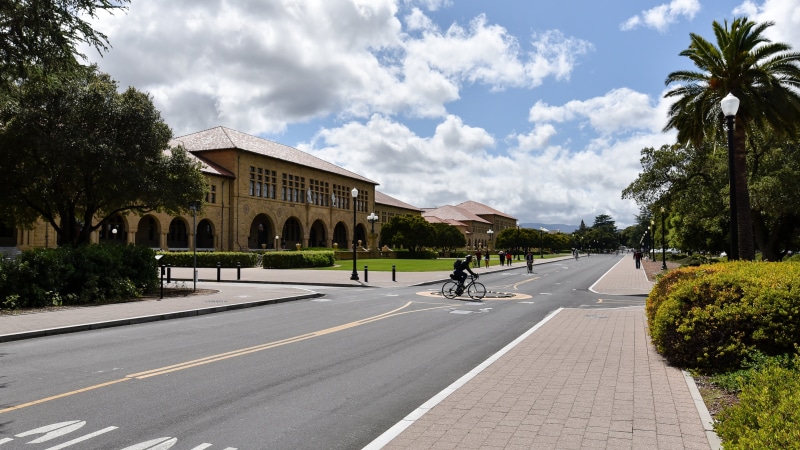 outdoors, california, plant, road marking, building, day, symbol, building exterior, tropical climate, tree, cloud - sky, incidental people, transportation