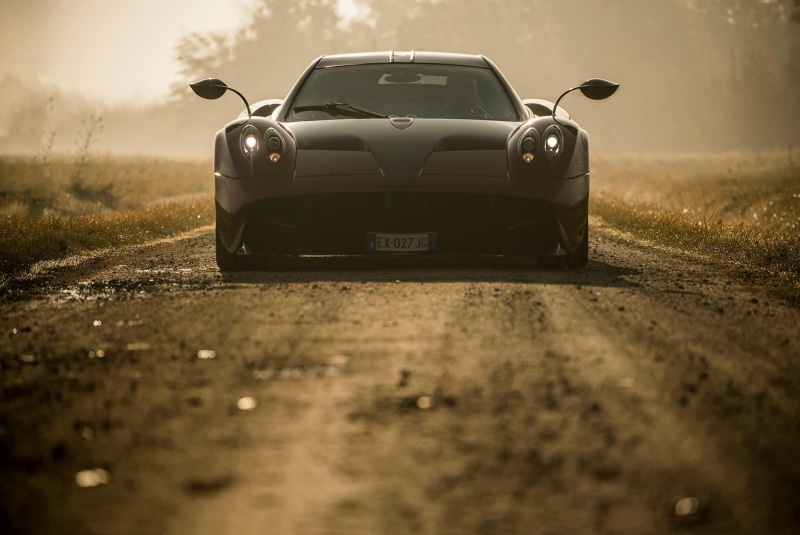 retro styled, afternoon, selective focus, Huayra, ford, road, gray, motor vehicle, land vehicle, travel, sports car, outdoors, motion, speed, grass, road trip