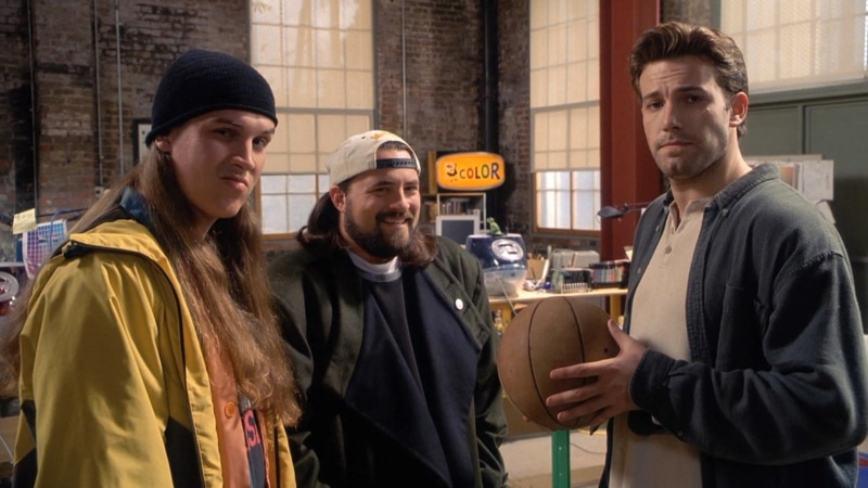 young men, standing, smiling, street, small group of people, mid adult men, 720P, jay and silent bob strike back, adult, group of people, people, building exterior