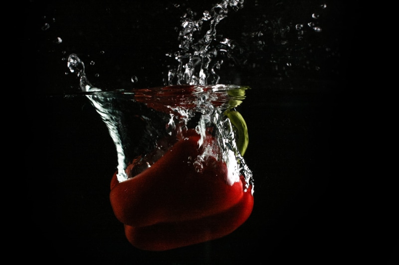 4K, studio shot, indoors, freshness, Red Paprika, bubble, liquid, black background, drop, falling, black Color, splashing, paprika, sinking, red, color Image