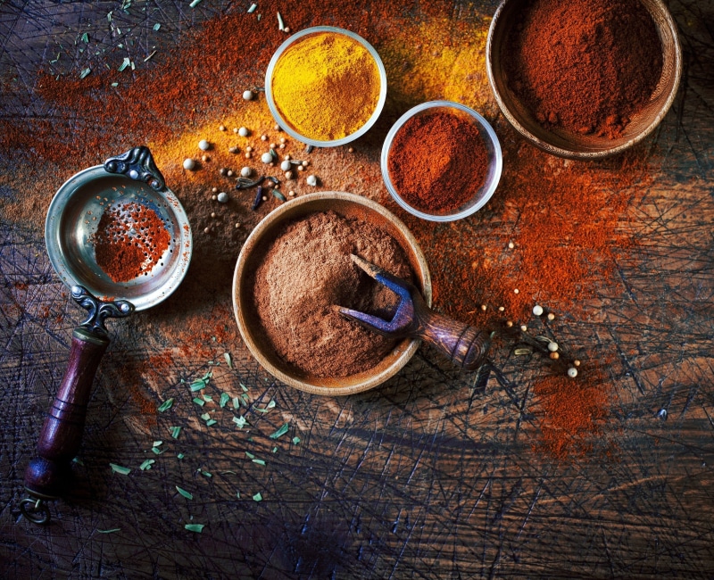 paprika, still life, spices, ground - culinary, chili pepper, high angle view, freshness, multi colored, wood - material, bowl, red chili pepper, no people