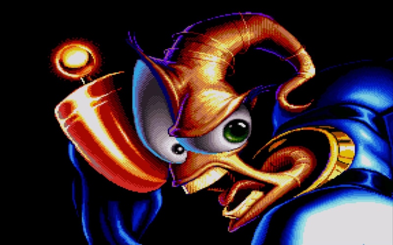 video games, multi colored, sega genesis, mask - disguise, close-up, representation, Earthworm Jim, festival, black background, indoors, carnival - celebration event
