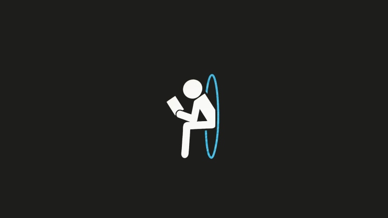 video games, information, copy space, indoors, Portal (game), single object, black background, studio shot, close-up, human representation, sign, male likeness