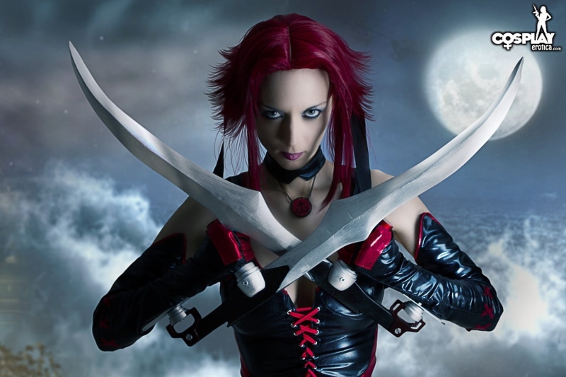 looking at camera, sport, one person, 720P, sword, teenager, costume, waist up, young women, females, hairstyle, dyed red hair, young adult, beautiful woman