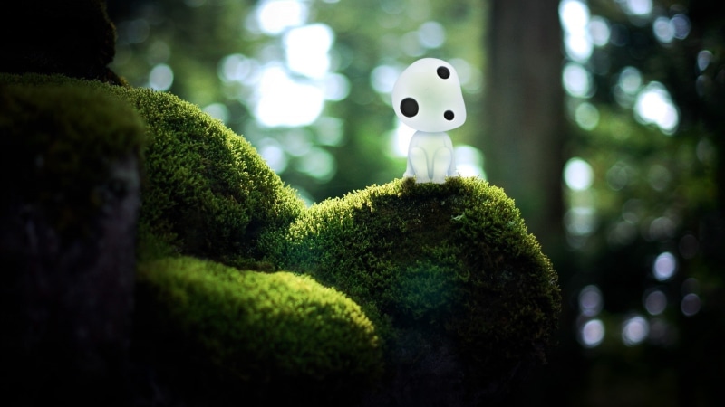 studio ghibli princess mononoke kodama, selective focus, close-up, night, plant, grass, nature, animal representation, focus on foreground, outdoors, smiling