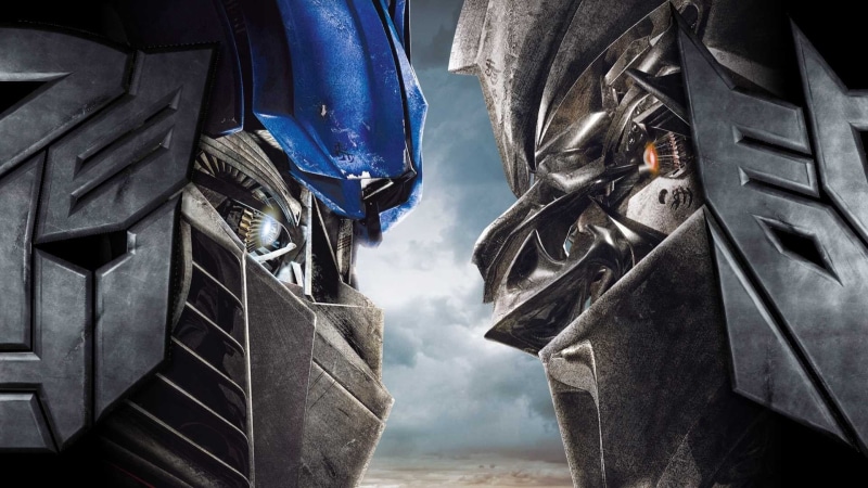optimus prime, water, land Vehicle, close-up, outdoors, protection, shoe, travel, day, black, 1080P, two, megatron, mode of transportation, focus on foreground