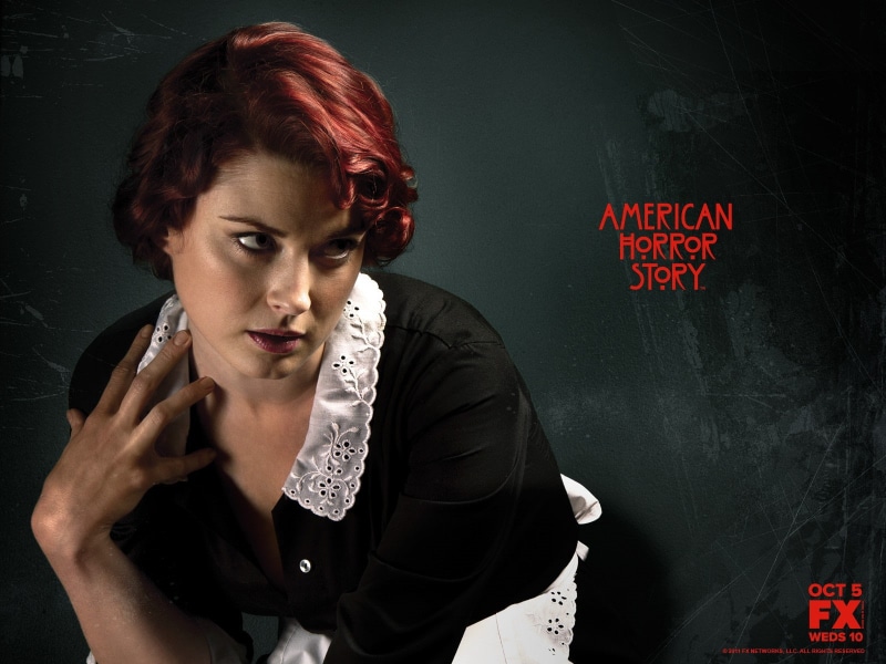 front view, text, 720P, indoors, communication, waist up, lifestyles, dyed red hair, dyed hair, American Horror Story, beautiful woman, board, hairstyle