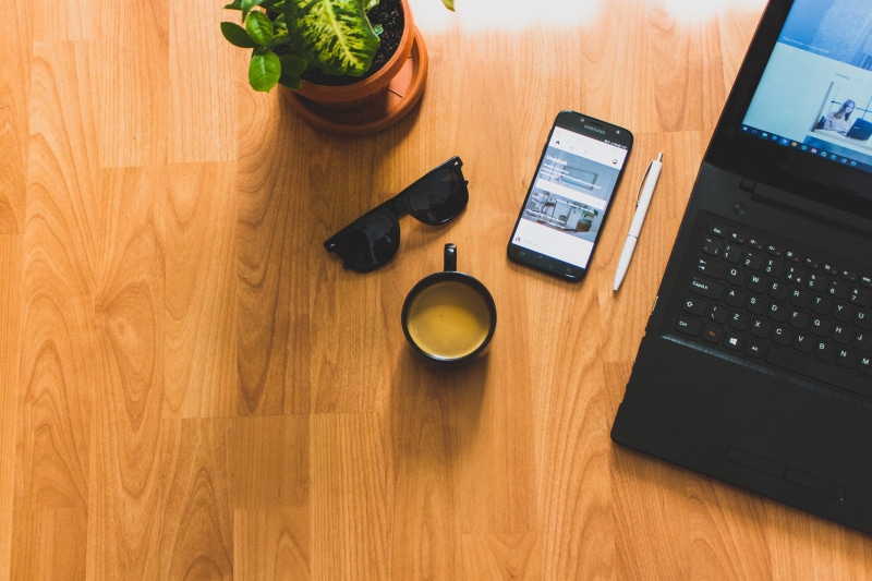 desk, office, furniture, food and drink, mobile phone, smartphone, smart phone, connection, phone, notebook, mug, technology, portable information device