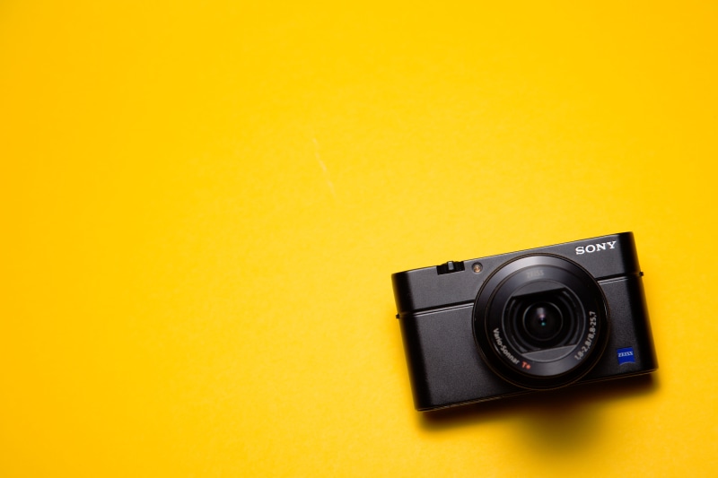 studio shot, vibrant, technology, colourful, indoors, retro styled, photographic equipment, colored background, camera - photographic equipment, colorful
