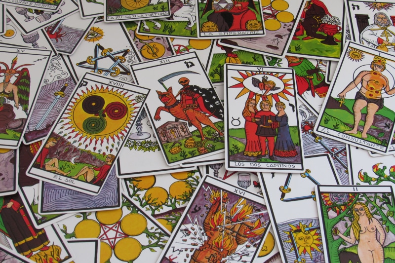 assorted, large group of objects, design, card games, fortune telling, art and craft, no people, collection, female likeness, tarot, paper, multi colored