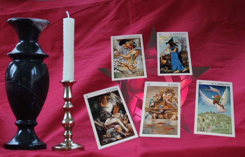 picture frame, gypsy, frame, close-up, spiritual, occult, group of objects, choice, urn, human representation, variation, still life, high angle view, male likeness
