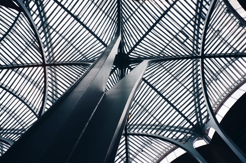 glass - material, architecture, human body part, metal, arch, pattern, day, directly below, modern, indoors, abstract, design, skylight, built structure