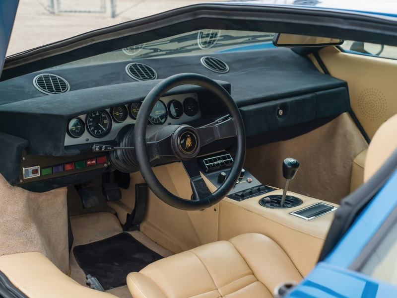 glass - material, car interior, steering wheel, cockpit, blue cars, road trip, control panel, outdoors, Lamborghini Countach, land vehicle, vehicle interior
