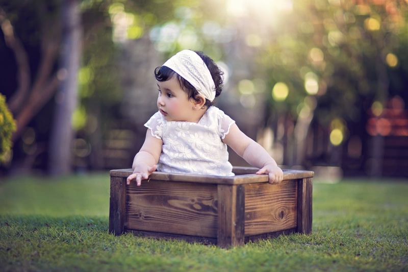 clothing, child, cute, hat, plant, innocence, looking, focus on foreground, real people, nature, young, looking away, childhood, baby, outdoors, one person