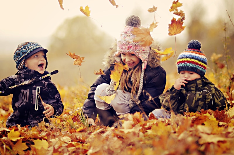 innocence, jacket, girls, males, smiling, daughter, knit hat, mother, cheerful, black, plant part, joy, winter, multi Colored, children, females, tree