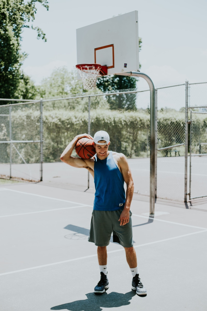 carrying, full length, men, 5K, standing, court, sport, cap, basketball - sport, teenage boys, man, portrait, athletic, guy, game, looking at camera, model