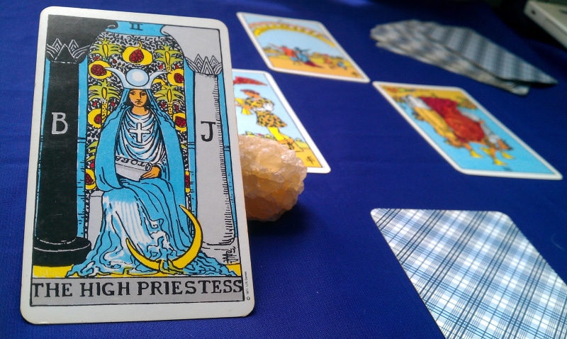 finance, human representation, close-up, male likeness, text, tarot card, history, occult, pattern, magic, prediction, art and craft, business, indoors