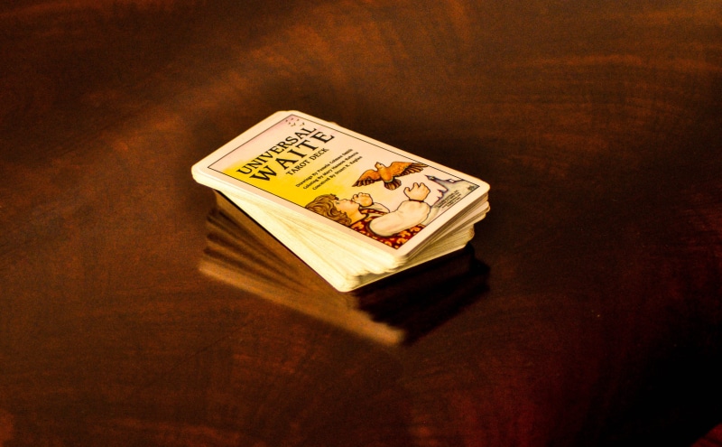 fortune, wooden, cards, copy space, high angle view, magic, single object, indoors, ingot, communication, 4K, table, text, tarot deck, directly above