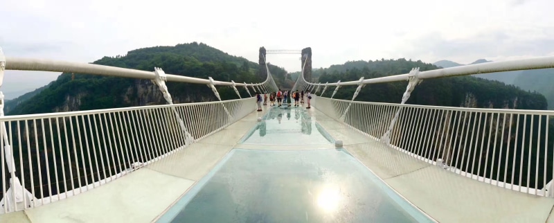 travel destinations, water, tree, chinese glass bridge, transportation, city, tourism, city life, connection, outdoors, panoramic, architecture, zhangjiajie
