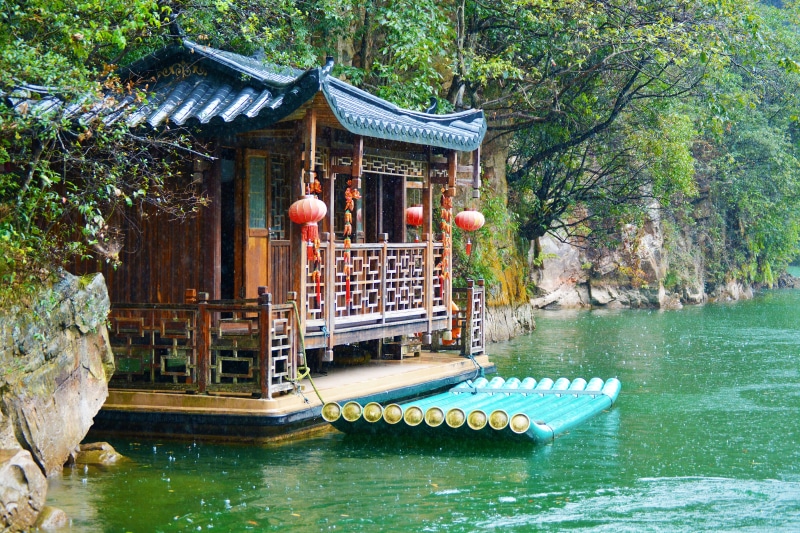 tree, building, architecture, religion, day, lake, mountain, baofeng, zhangjiajie, spirituality, building exterior, nature, canal, travel destinations