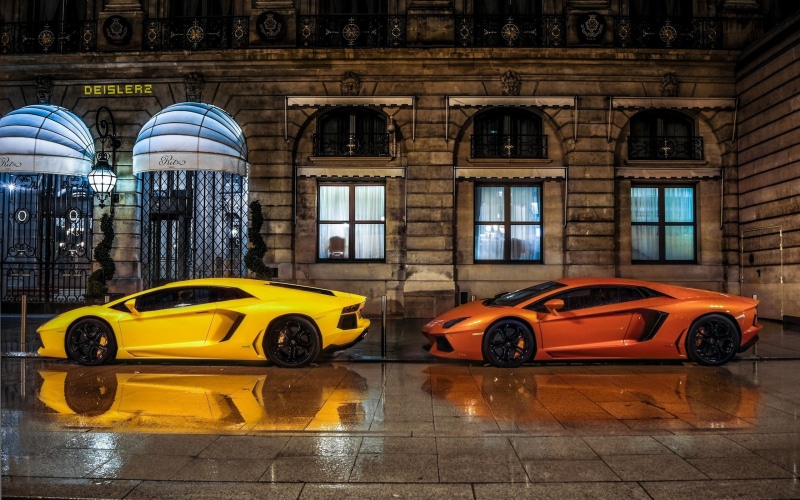 taxi, building exterior, day, land vehicle, two, architecture, 2K, car, outdoors, built structure, cars, Lamborghini, motor vehicle, yellow taxi, red