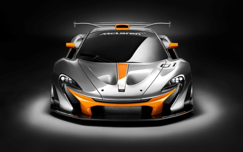 black color, studio shot, winning, silver, McLaren, mode of transportation, wheel, black background, transportation, car, orange color, luxury, sport, sedan