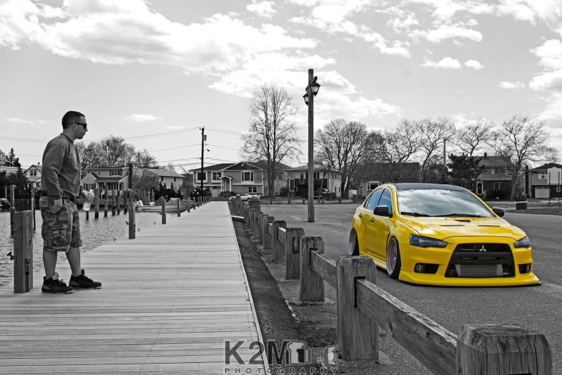 transportation, nature, day, architecture, yellow, outdoors, public transportation, road, motor vehicle, mode of transportation, Mitsubishi Lancer Evo X