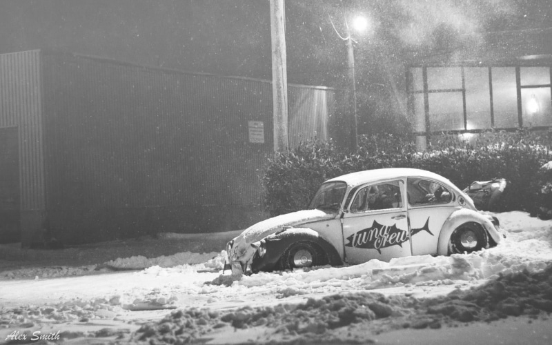 building exterior, built structure, winter, outdoors, car, land vehicle, transportation, street, beetle, night, architecture, blizzard, Volkswagen, city