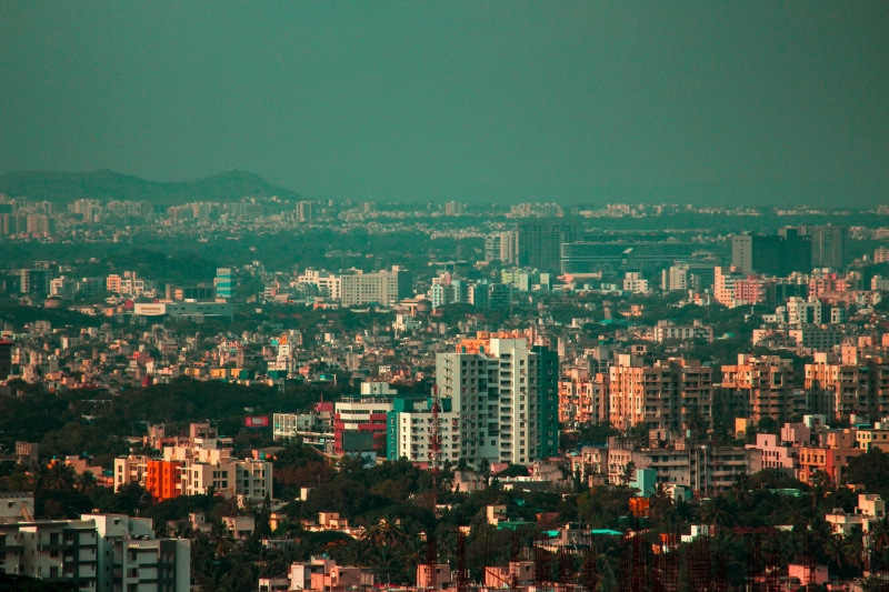 sky, lights, building exterior, cityscape, rain, high angle view, apartment, office building exterior, skyscraper, india, day, street, city life, clear sky