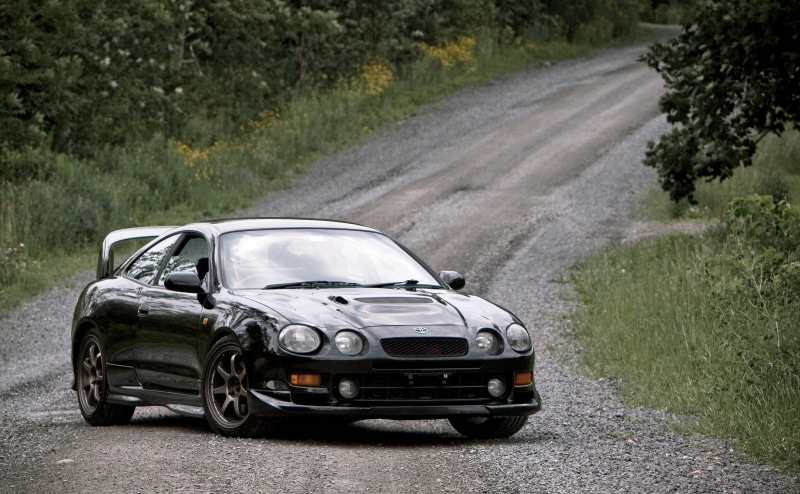 transportation, coupe, vintage car, land, Toyota, road trip, motor vehicle, stationary, land vehicle, celica, retro styled, dirt road, tree, luxury, outdoors