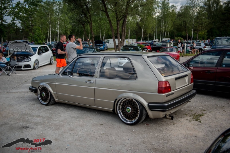 mode of transportation, incidental people, city, Volkswagen, land vehicle, car, road, outdoors, tuning, street, group of people, Audi, day, parking, tree