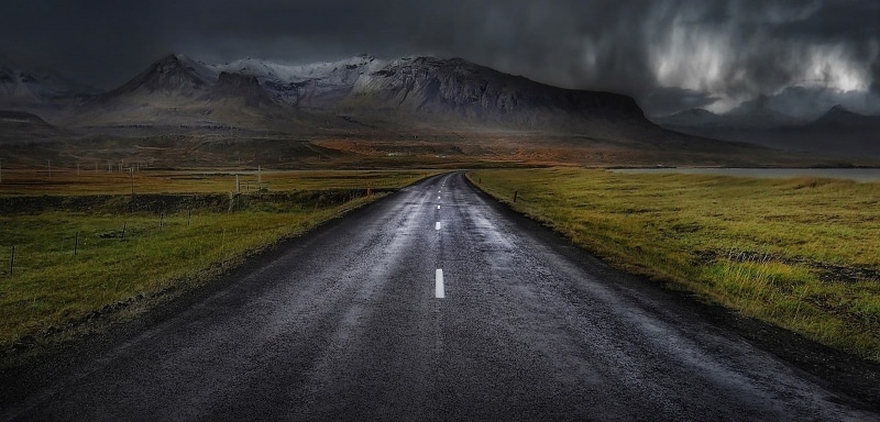 sky, road, land, highway, night, non-urban scene, no people, transportation, asphalt, tranquility, environment, direction, nature, grass, mountains, travel