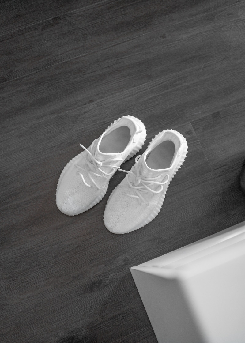clogs, indoors, boost, 5K, nachos, hardwood, food, absence, yeezy, two objects, sneaker, footwear, cream, running shoe, pair, sink, single object, compatibility