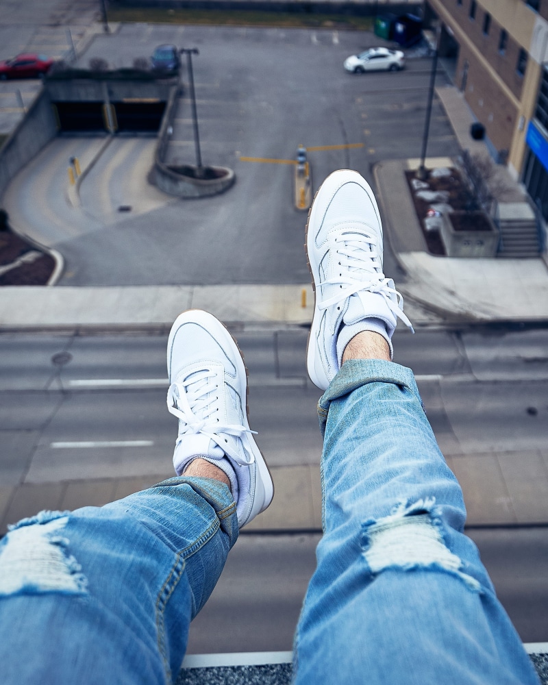 day, pants, vehicle, denim, clothing, running shoe, shoe, human foot, human, 2K, leisure activity, apparel, white, reebok, transportation, low section
