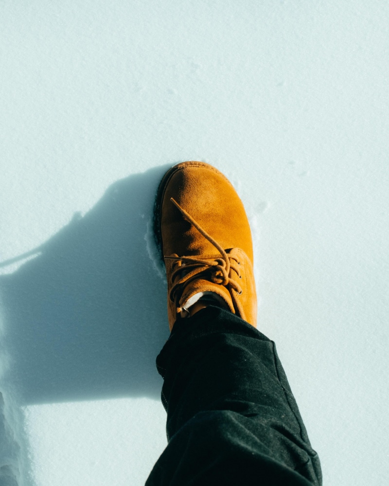 footwear, leisure activity, alloy wheel, machine, personal perspective, jeans, indoors, ankle, day, pants, high, high angle view, low section, sneaker