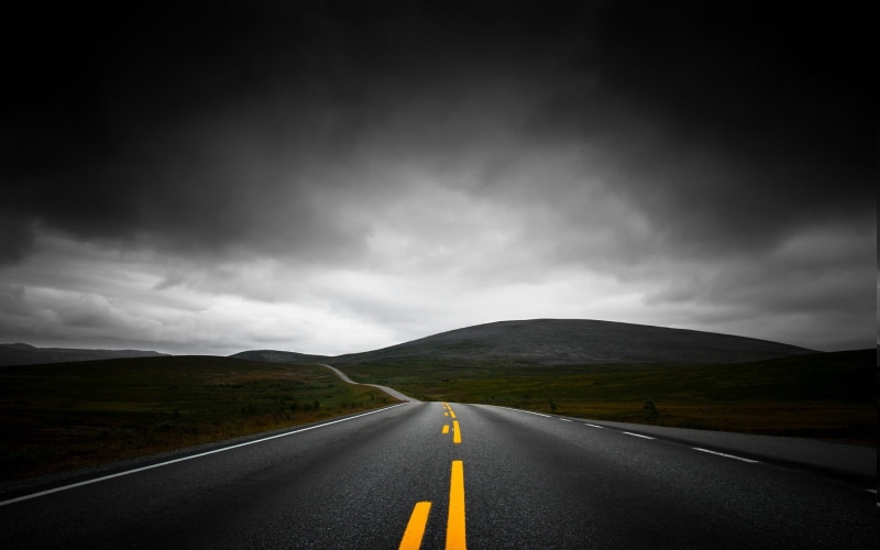 cloud - sky, road marking, journey, rain, no people, road, marking, symbol, nature landscape highway dark clouds mountain sky asphalt lines yellow black