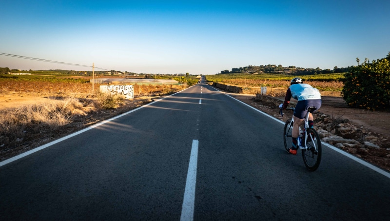 activity, bike, one person, person, sport, cycling, wheel, leisure activity, motion, man, machine, sports clothing, nature, ride, bicycle, slope, tarmac