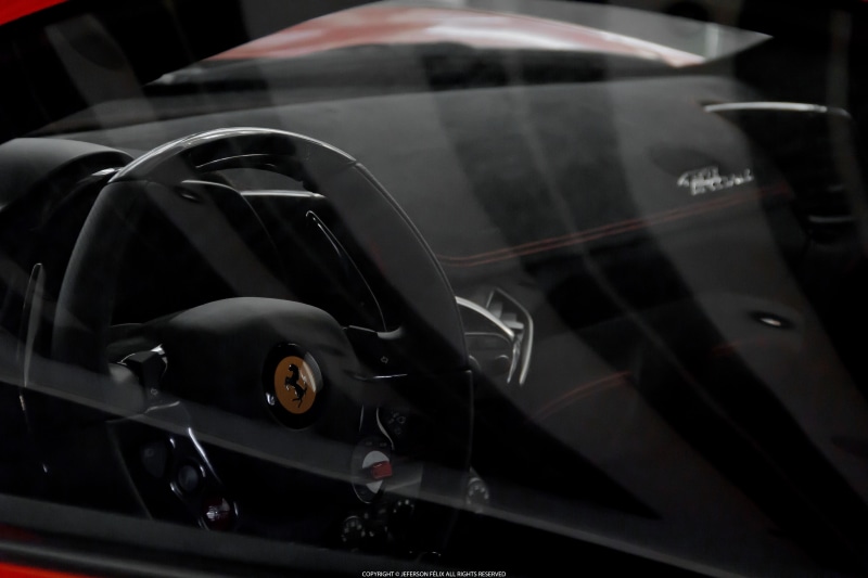 land vehicle, black color, motor vehicle, no people, reflection, close-up, retro styled, still life, transportation, day, metal, glass - material, Ferrari 458 Speciale