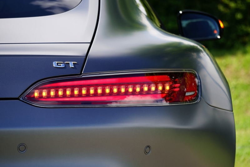 mode of transportation, lighting equipment, modern, vibrant color, collectors car, gts, 4K, vehicle light, speed, badge, automobile, motor, close-up, edition